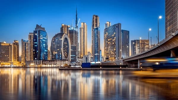 Night view of Business Bay district with illuminated buildings